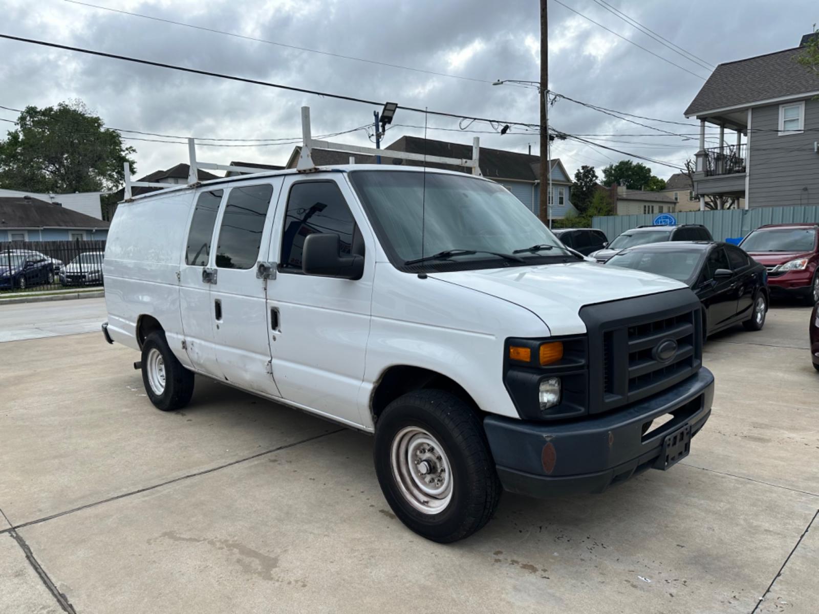 2014 White /Gray Ford E-Series Van E-350 Super Duty Extended (1FTSS3EL5ED) with an 5.4L V8 SOHC 16V FFV engine, 6-Speed Automatic transmission, located at 1501 West 15th St., Houston, 77008, (713) 869-2925, 29.797941, -95.411789 - Photo #1